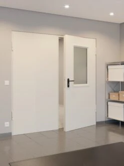 HÖRMANN Innentür-Set Stahl Mehrzwecktür D65-2 OD Mit Lichtausschnitt LA-B2 Im Gehflügel Inkl. Blockzarge -Türen Verkauf 2.2 funktionsfluegeltueren d 65 la b2 ral9002 219865 stilwelt closeup flur